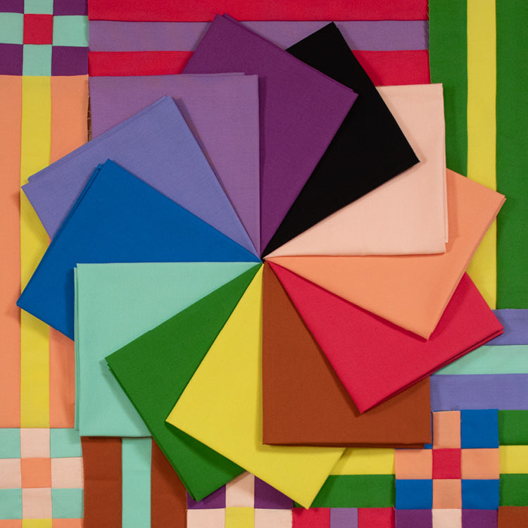 Colorful square fabric samples on a multicolored background