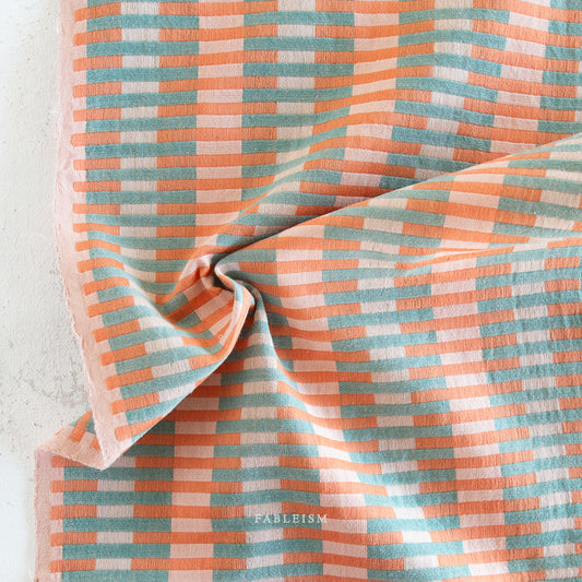 Fableism Lucky Loom Interlock in Watermelon - reversible woven cotton fabric in pink, orange, and mint stripes